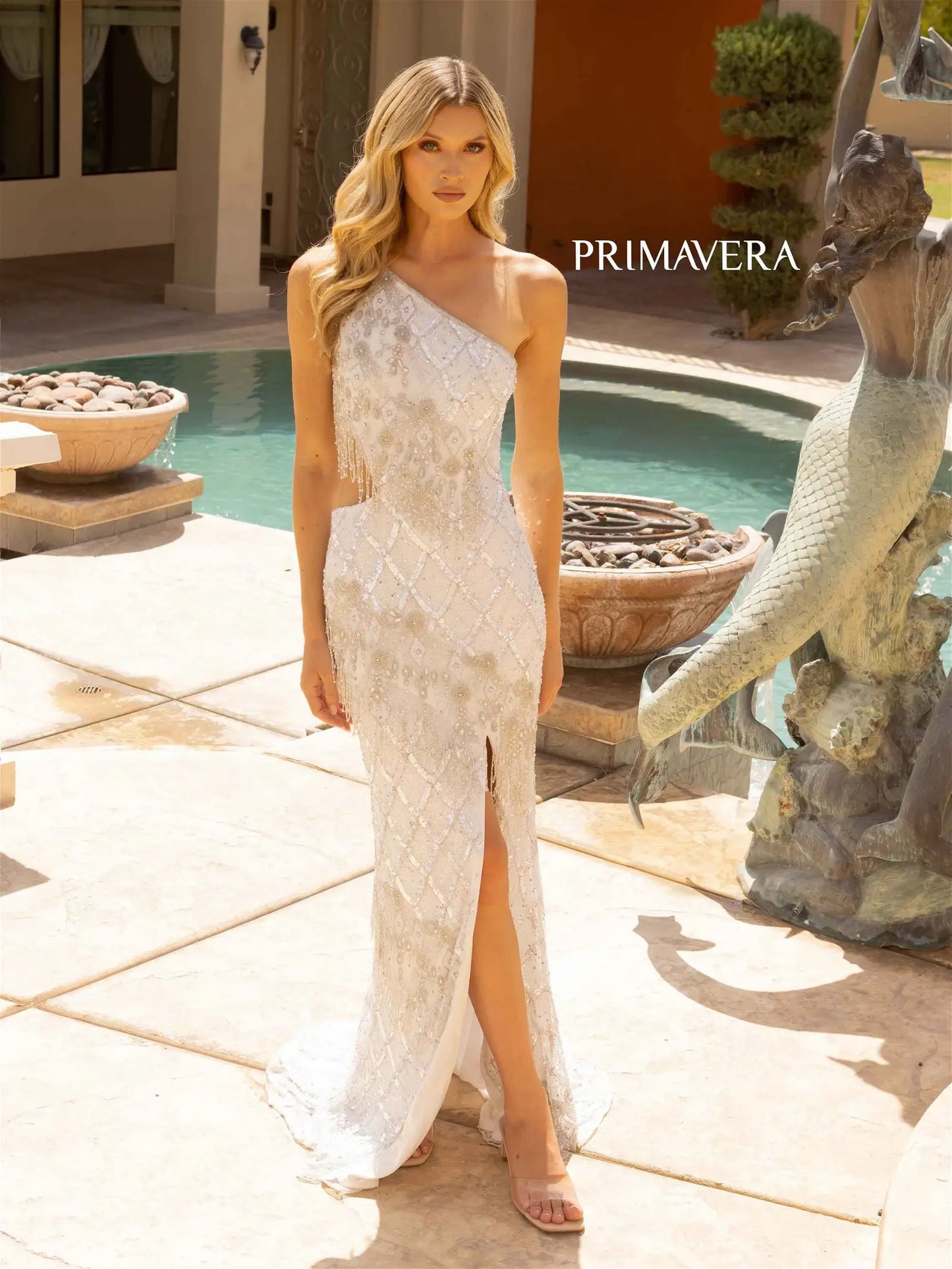 Primavera Couture 12051 Prom Dress Long Beaded Dress. This gown is gorgeous with the one shoulder and fringe. 