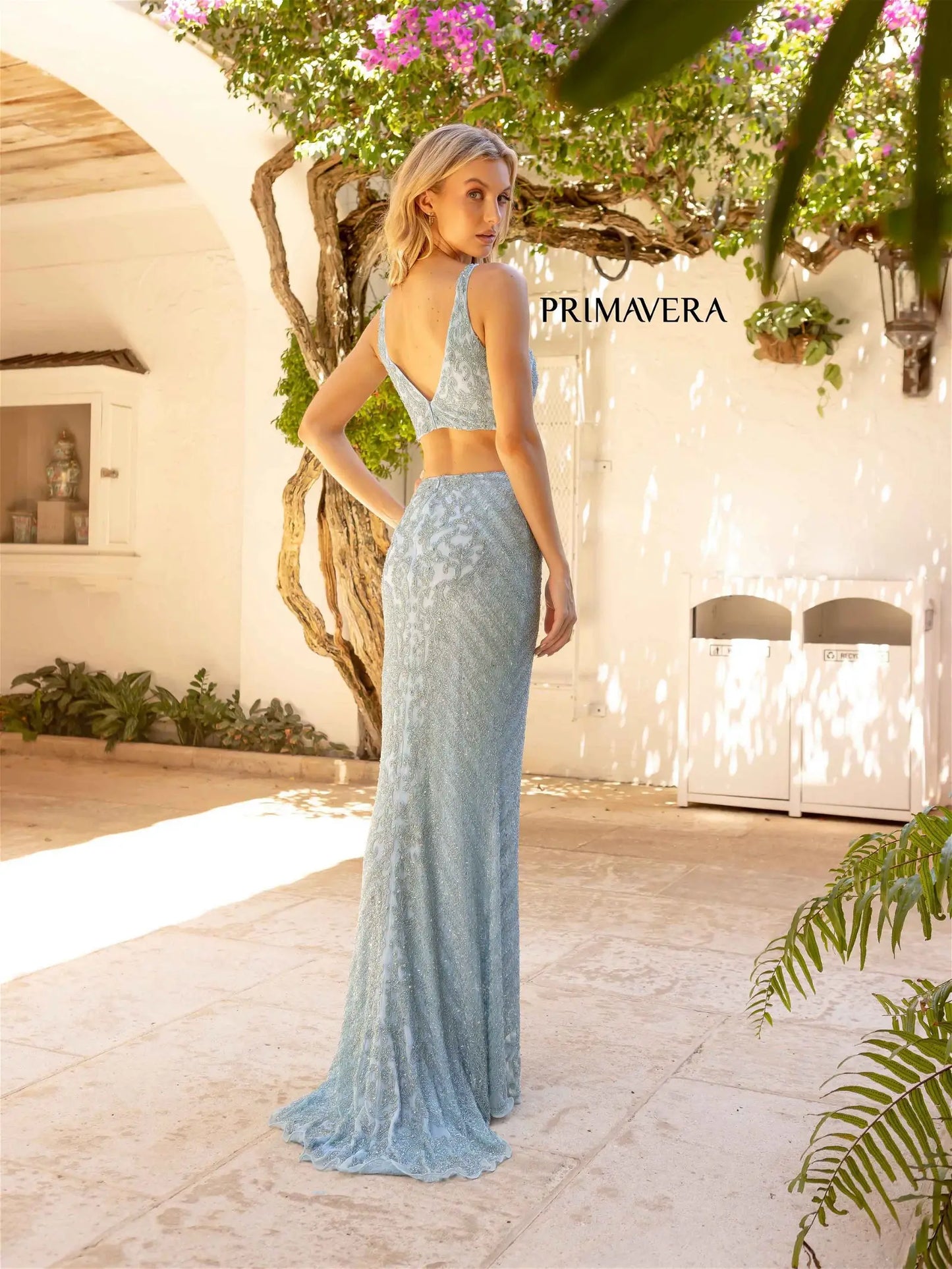 Primavera Couture 12061 Prom Dress Long Beaded gown. This gown has such a beautiful design on it. it also has an open back. 