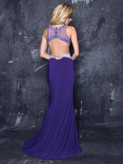 Nina Canacci 1323 This embellished sheer neckline long prom dress has a sheer back and a cutout in the back.  The evening gown is fitted and has a side slit. Color Purple  Size 4