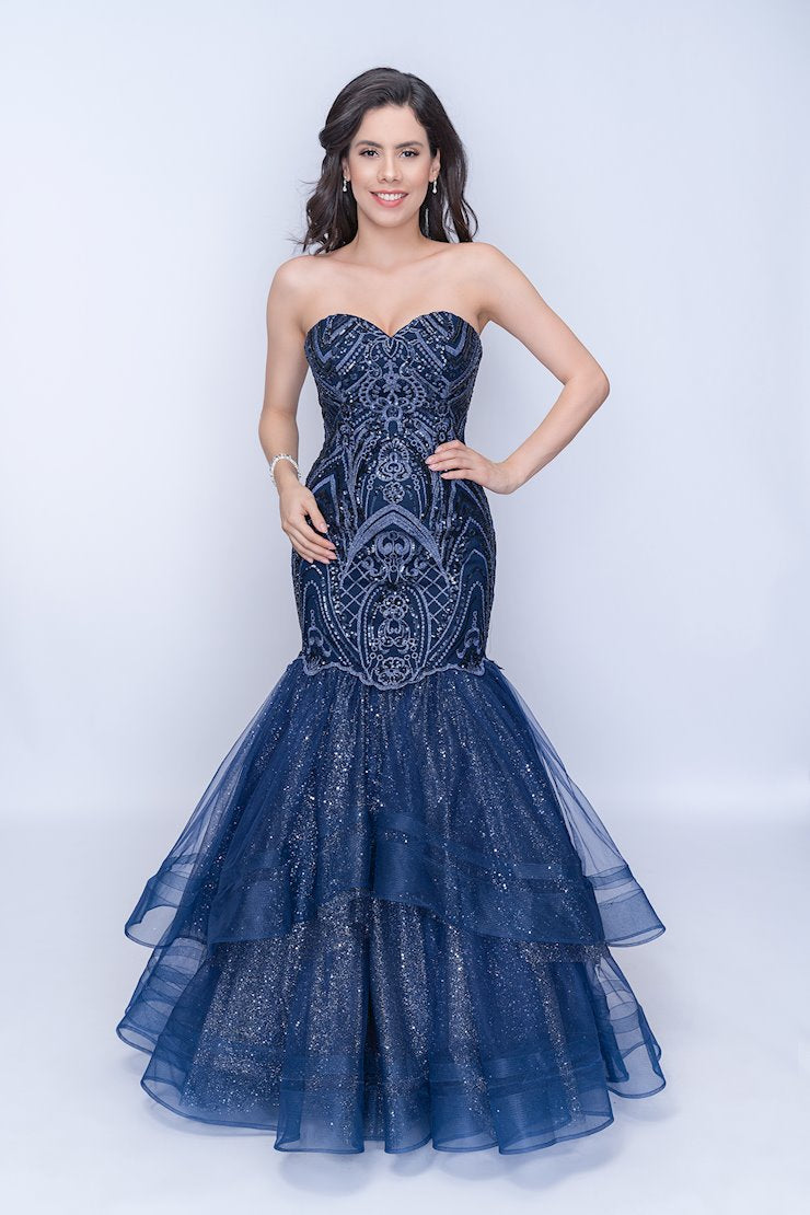 Nina Canacci 1407 is a long fitted mermaid prom dress. strapless sweetheart neckline with a fitted embroidered lace embellished bodice. trumpet flared mermaid skirt features layers of glitter tulle ruffled with double horse hair traim.  Available Size: 4  Available Color: Navy