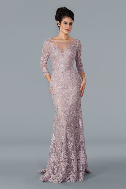 Stella Couture 22354 is a long-sleeved, sheer formal dress perfect for a wedding. Crafted from delicate lace, this elegant silhouette flatters and highlights your figure. The perfect wedding guest gown. Stella Couture 22354 Long Fitted Gown Lace High Neck  Available Color- Rose  Available Size- 4-20