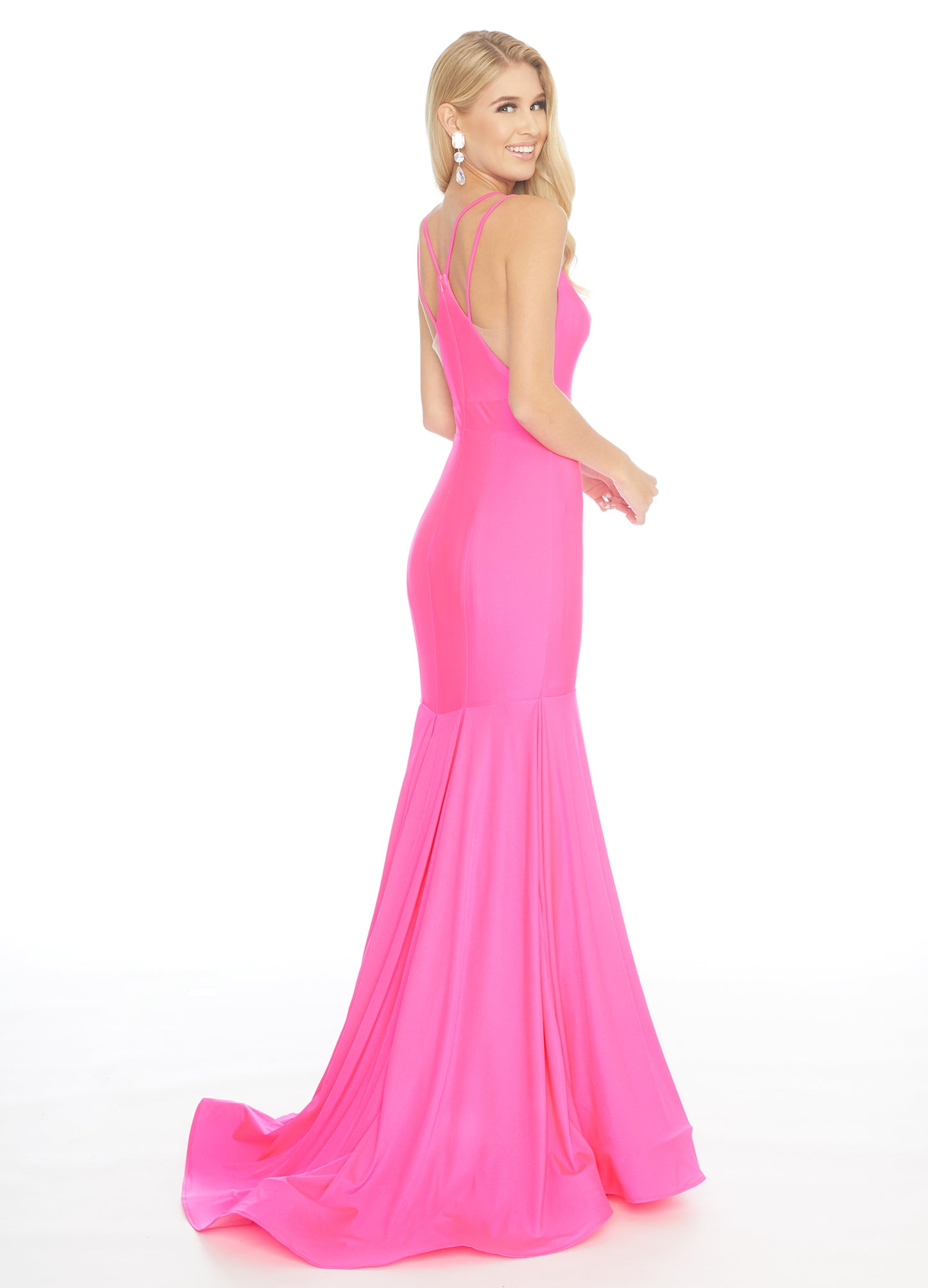 Ashley Lauren 1870 This stunning fit & flare evening gown is sure to turn heads! The bustier is has a v-neckline complete with double spaghetti straps and illusion panel sides. The skirt embellished with box-pleats and sweeping train. Racer Back Jersey  Available Sizes: 12  Available Colors: Hot Pink