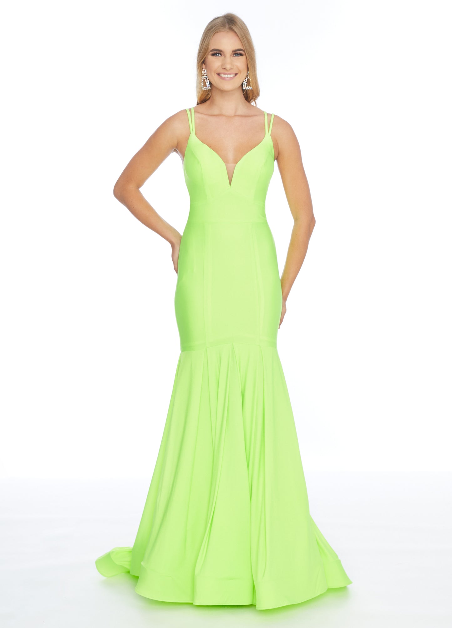 Ashley Lauren 1870 This stunning fit & flare evening gown is sure to turn heads! The bustier is has a v-neckline complete with double spaghetti straps and illusion panel sides. The skirt embellished with box-pleats and sweeping train. Racer Back Jersey  Available Sizes: 2  Available Colors: Neon Green