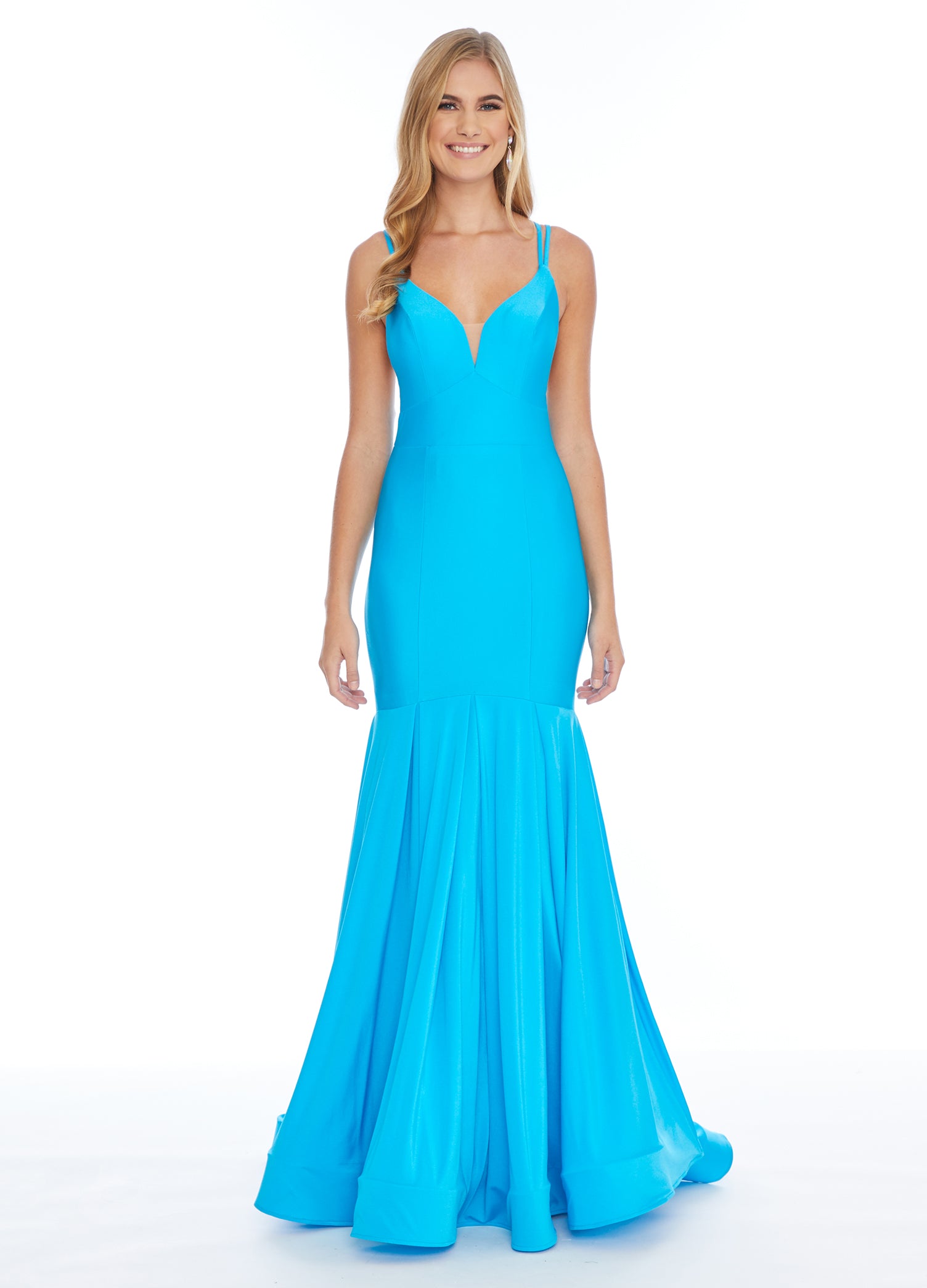 Ashley Lauren 1870 This stunning fit & flare evening gown is sure to turn heads! The bustier is has a v-neckline complete with double spaghetti straps and illusion panel sides. The skirt embellished with box-pleats and sweeping train. Racer Back Jersey