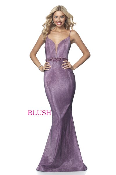 Blush Prom 11989   Fit flare style in a shimmer knit fabric that features a plunging sweetheart neckline accented with a modesty panel, beaded straps, and a beaded waistline.
