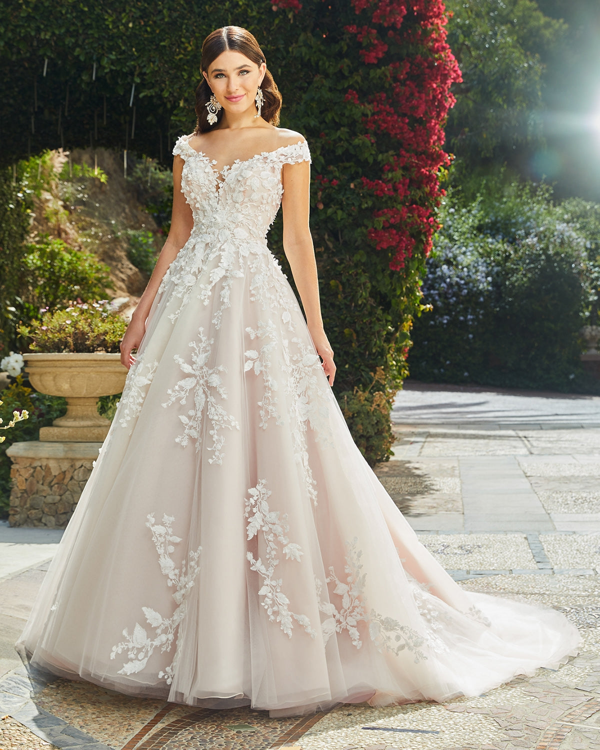 Casablanca Bridal 2406 EVELINA Off the shoulder wedding dress ballgown Bridal Gown. Modern-feminine-chic never looked better than Style 2406 Evelina by Casablanca Bridal. Bold and soft all at once, this classic ballgown wedding dress features a breathtaking sweetheart neckline and off-shoulder sleeves, delicately covered in blooming 3D floral lace. An illusion keyhole back opens up to frame a dreamy row of buttons,