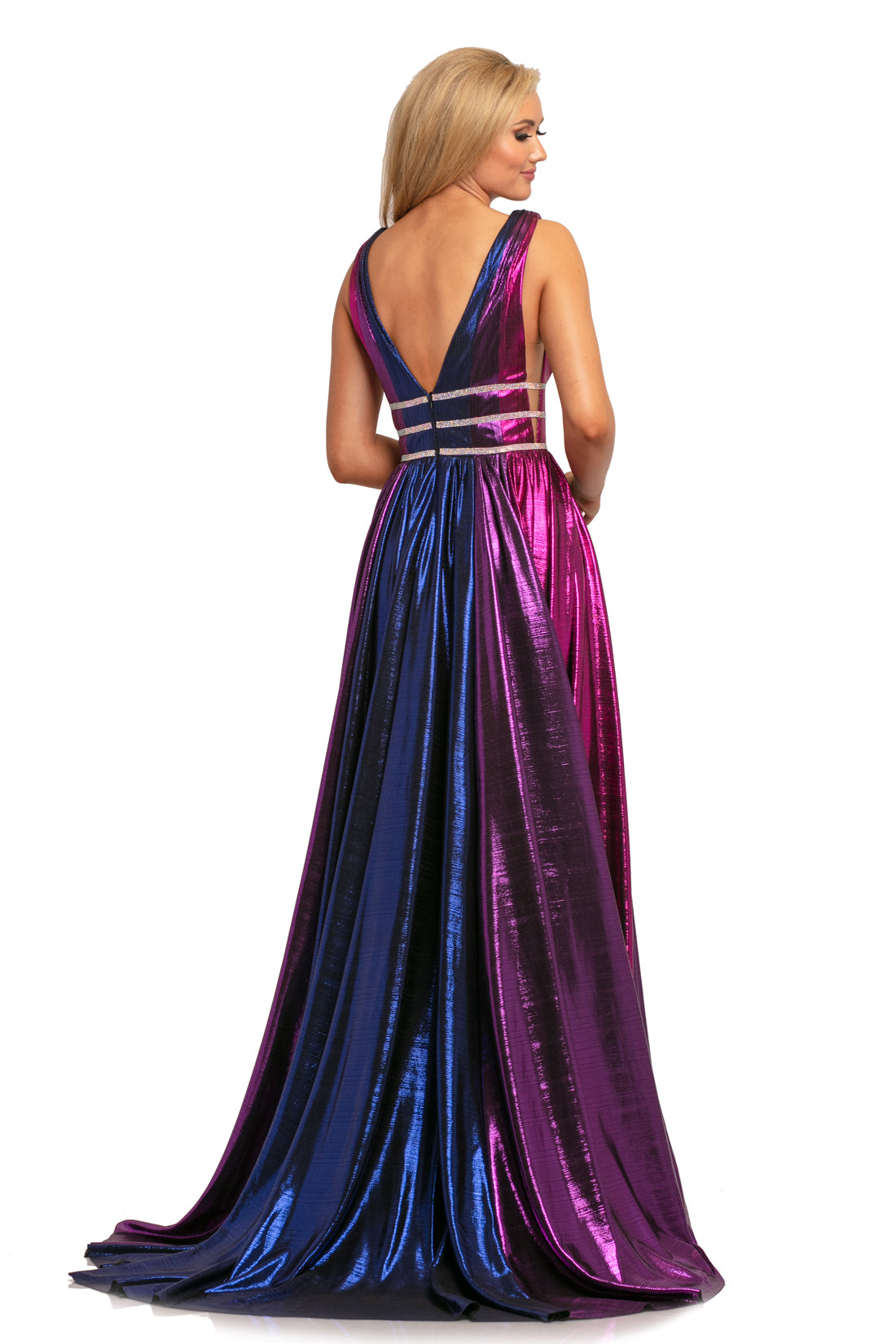 Johnathan Kayne 2008 is a Metallic Multi Color Prom Dress, Pageant Gown & Formal Evening Wear! This gown Features a Metallic Shimmer Multi Color Material. Deep V Plunging Neckline with a triple Crystal Embellished Waist Band. Sheer mesh Cutout side panels. Open V Back. The Pleated Skirt Features Yards of extra material for a lush look with the dimensional colors.