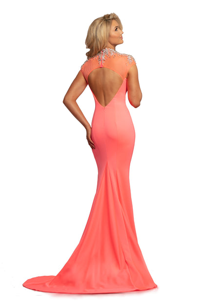 Johnathan Kayne 2024 is a fit and flare mermaid Prom Dress, Pageant Gown & Formal Evening Wear Gown. This long Fit & Flare Mermaid Prom Dress features an illusion sweetheart neckline with a sheer Crystal Embellished High neckline and cap sleeve. Slit in the skirt and small train.