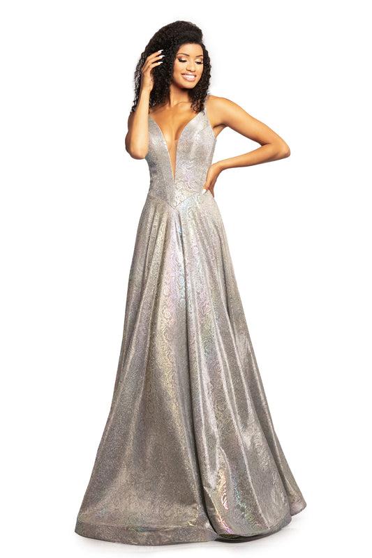 Johnathan Kayne 2094 is a metallic holographic Prom Dress, Pageant Gown & Formal Evening Wear. This long Gown Features a Metallic Glitter Floral Rose Design with a plunging neckline and spaghetti straps. This fitted bodice flows into a beautiful color changing A line skirt.