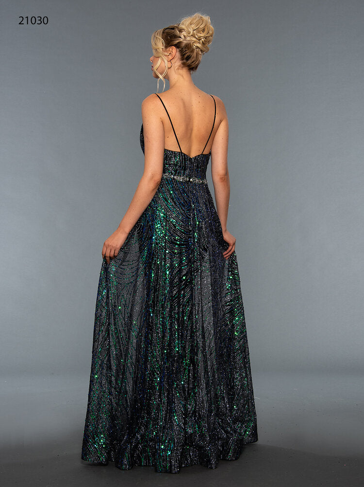 Stella Couture 21030 Long fitted v neckline formal prom & Pageant Dress. Black with blue/green multi sequin accents. Embellished spaghetti straps. Overskirt with sweeping train. Great gown for any formal event!  Available Sizes: 0-16  Available Color: Black/Multi