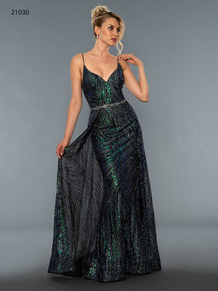 Stella Couture 21030 Long fitted v neckline formal prom & Pageant Dress. Black with blue/green multi sequin accents. Embellished spaghetti straps. Overskirt with sweeping train. Great gown for any formal event!  Available Sizes: 0-16  Available Color: Black/Multi
