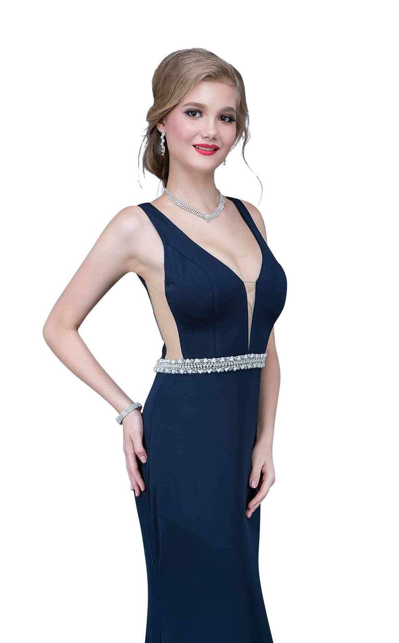 Nina Canacci 2124 This is a fitted plunging neckline with illusion panel prom dress.  This evening gown is long and illusion panels under the arms and an embellished belt. Color Navy  Size 4