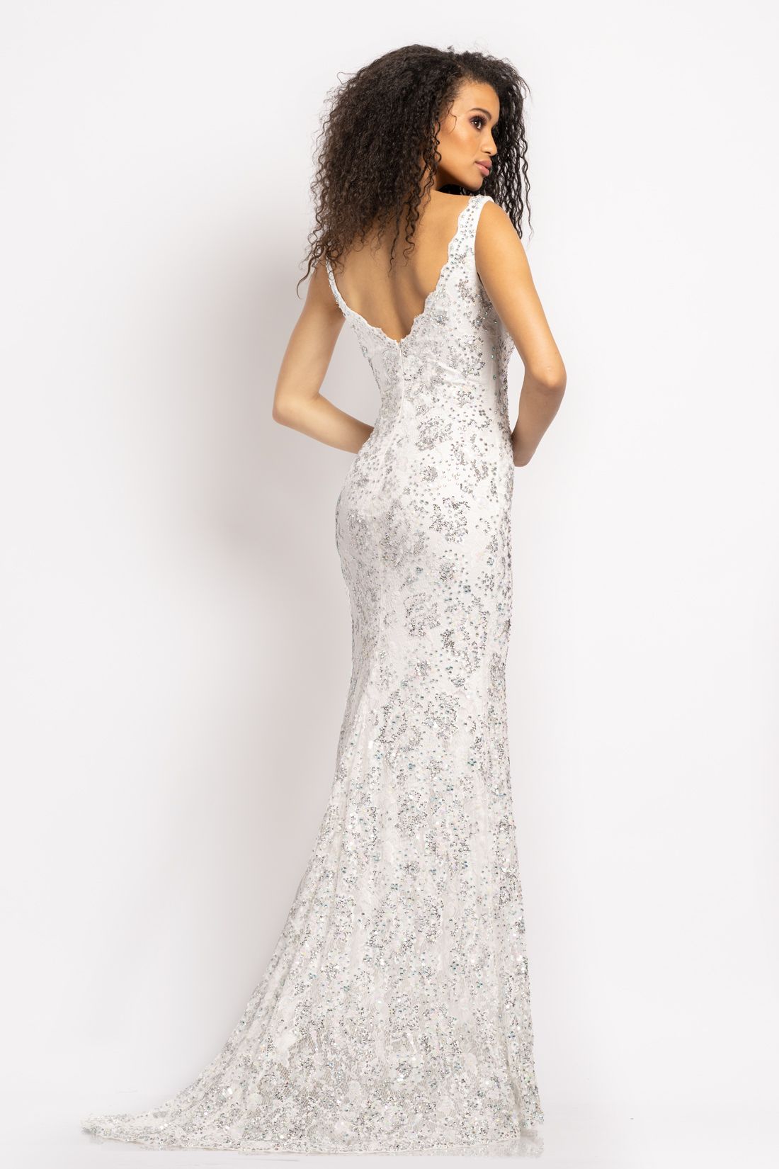 Johnathan Kayne 2181 Long White Lace Form Fitted Prom Pageant & Bridal Gown. This Stunning Evening Gown Features a scallop lace edge along the plunging neckline, slit and hem. Embellished with sequins, Crystal Rhinestones & Beading. This gown is a stunning as they come!  Available Color: White