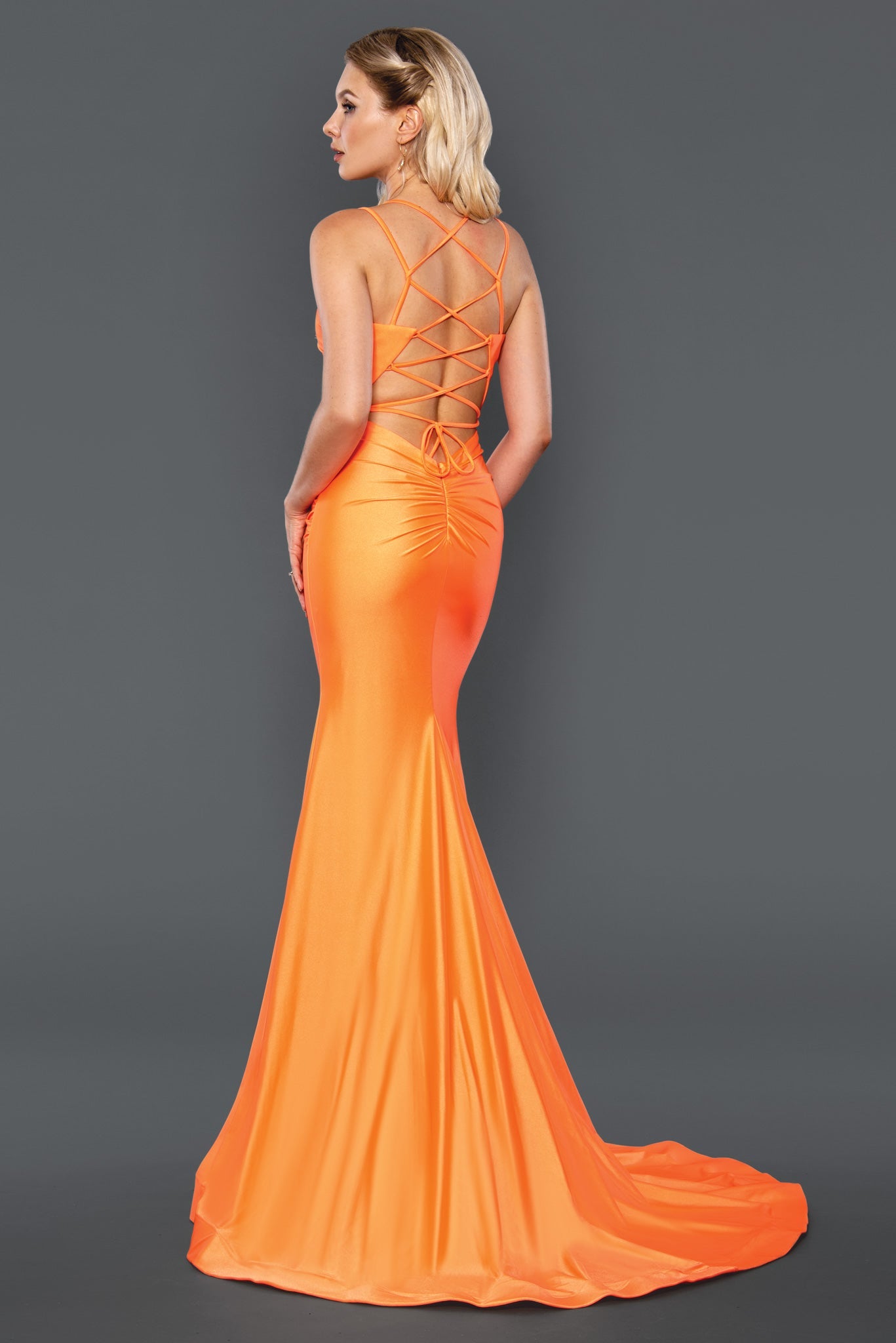 Stella Couture 22039 Long Fitted Formal Dress Prom Gown Backless unique Corset lace up. Ruched butt with sweeping train  Available Size: 0-12  Available Color: Lilac, Orange