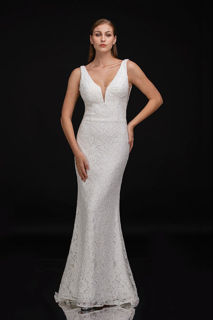 Nina Canacci 2229 is a Long Fitted solid Ivory Lace formal destination wedding dress, pageant gown & informal Bridal. Featuring a plunging V Neckline and open V Back. small sweeping train. Destination Lace Wedding Dress Open Back V Neck  Available Sizes: 00-10  Available Colors: Ivory