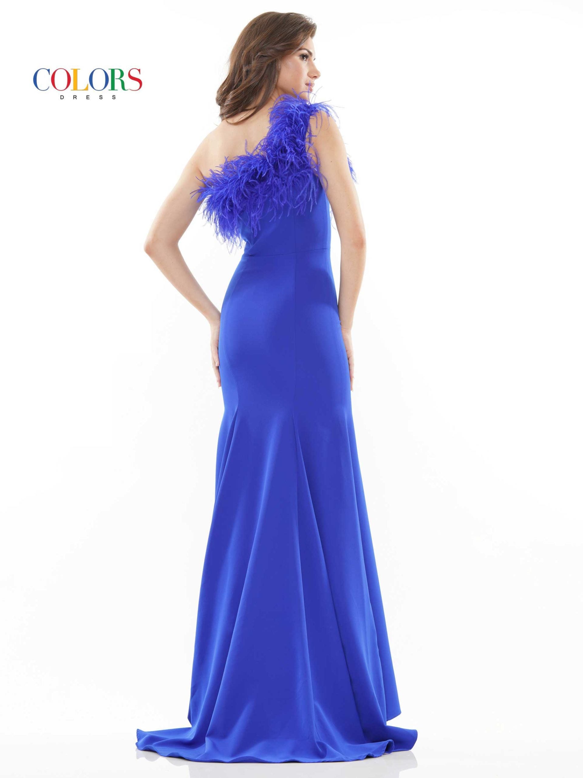 Colors Dress 2405 Fitted One Shoulder Feather Embellished Prom Dress Slit Gown 47″ one shoulder fit and flare crepe dress with ostrich feathers along the neckline, front slit  Available Sizes: 0-22  Available Colors: Black, Light Blue, Off White, Royal, Hot Pink