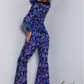 Johnathan Kayne 2681Long Sleeve Sequin Velvet Jumpsuit Pageant Gown Collar bell Bottom Jump on in to this fun stretch sequin velvet 2 piece jumpsuit. Fun fashion or dancing the night away, this unique design will get you on the best dressed list  Sizes: 00,0,2,4,6,8,10,12,14,16  Colors: Purple/Multi
