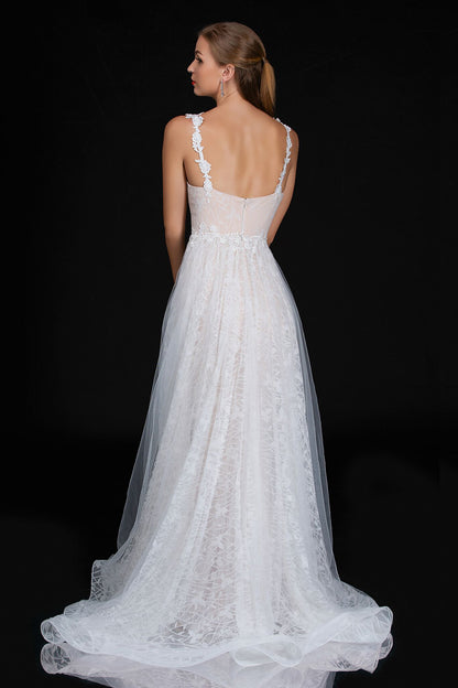 Nina Cancci 3159 is a long Lace Fitted Ivory Floral Lace Applique strap wedding dress. cracked Ice Over skirt and sweeping train. Stunning Destination Bridal Gown. Great for Plus Size! Glitter sweetheart neckline. Accented scroll pattern on the flowing overskirt. shimmering bridal gown or unique wedding dress. Sheer lace embellished straps.   Available Sizes: 8  Available Colors: Ivory/Nude
