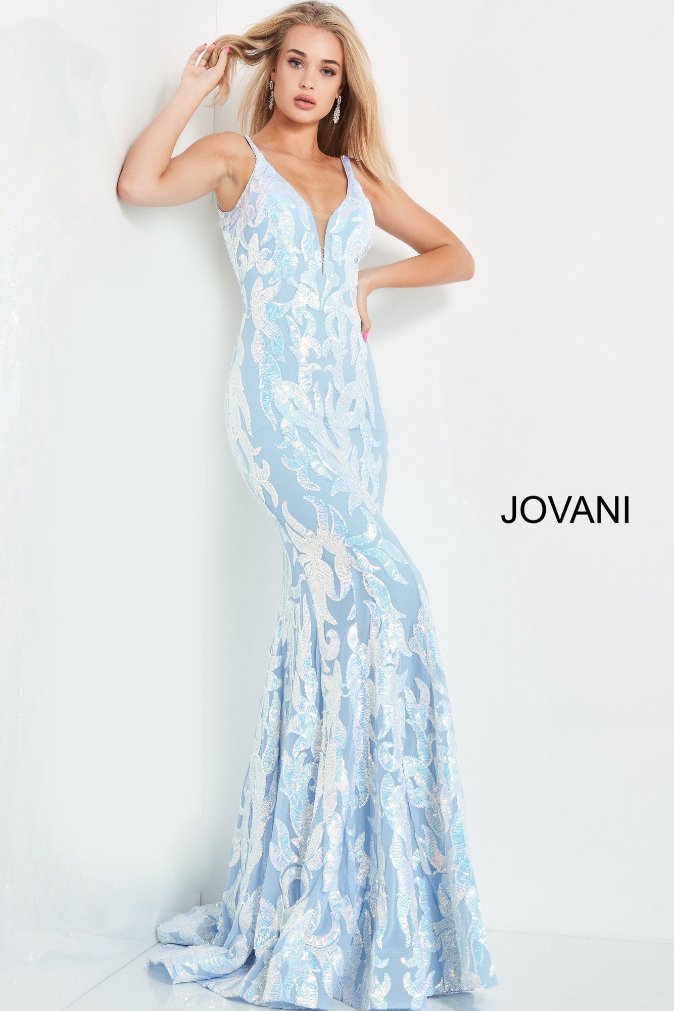 Jovani 3263 is a long Fitted Mermaid Prom Dress with a damask print sequin embellished pattern. Plunging V Neckline and open V Back. Lush Trumpet Skirt is great for the stage in this formal evening gown & Pageant Dress. Glass Slipper Formals