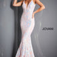 Jovani 3263 is a long Fitted Mermaid Prom Dress with a damask print sequin embellished pattern. Plunging V Neckline and open V Back. Lush Trumpet Skirt is great for the stage in this formal evening gown & Pageant Dress. Glass Slipper Formals