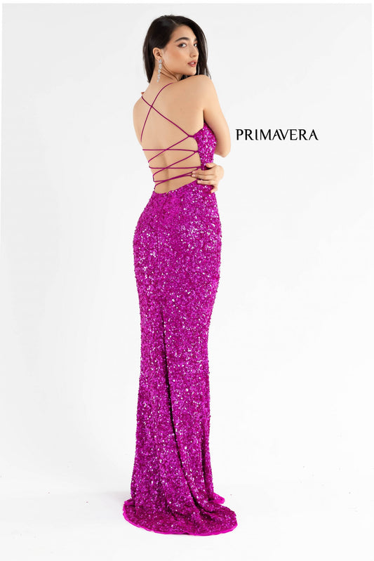 Primavera Couture 3290 This prom dress adds a pop to the multi sequins dress.&nbsp; With a scoop neckline and spaghetti straps that cross and tie in the back.&nbsp; This long evening dress has a side slit.&nbsp;

Available Colors:&nbsp;Fuchsia

Available sizes:&nbsp; 0