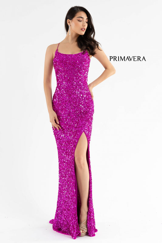 Primavera Couture 3290 This prom dress adds a pop to the multi sequins dress.&nbsp; With a scoop neckline and spaghetti straps that cross and tie in the back.&nbsp; This long evening dress has a side slit.&nbsp;

Available Colors:&nbsp;Fuchsia

Available sizes:&nbsp; 0