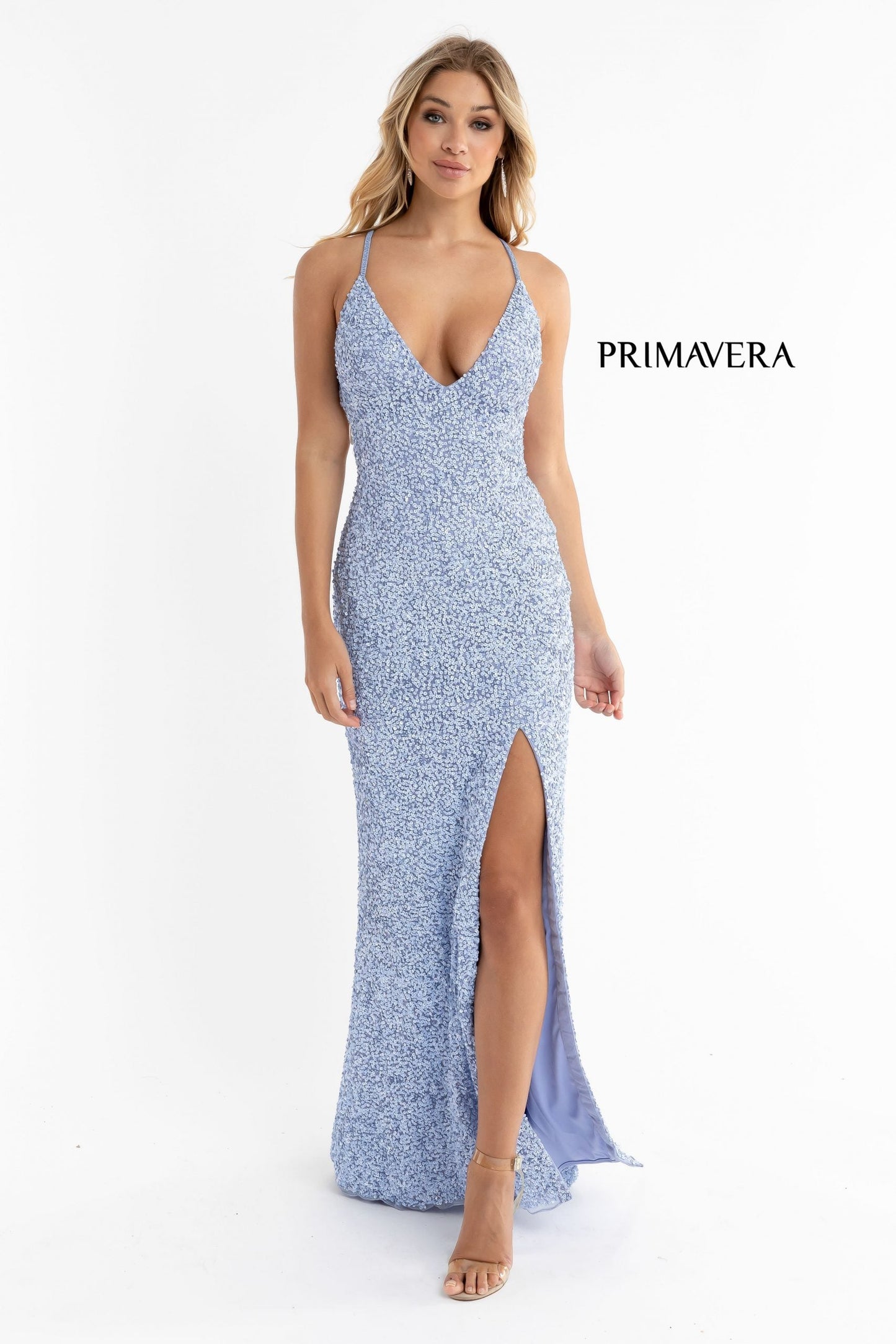 Primavera Couture 3291 Exclusive Prom Dresses.&nbsp; This long prom dress is embellished throughout with shimmering sequins.&nbsp; This impressive evening gown showcases a v neckline, thin beaded straps and crisscrossed straps in the open back. The long slim skirt has a sultry high side front slit.&nbsp;

Back Style&nbsp;Back Zipper, Open Back
Detail&nbsp;Slit
Length&nbsp;Long, 63-65" Hollow to Hem
Material&nbsp;Beaded, Sequins
Neckline&nbsp;V Neck
Style&nbsp;Fitted

Available Colors:&nbsp;Neon Lilac

Avail