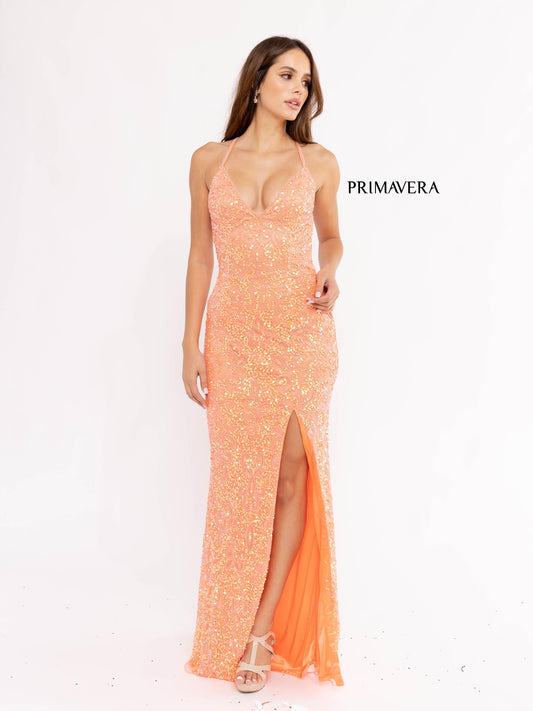 Primavera Couture 3295 Exclusive  Prom Dress, Formal Evening Gown.  This exclusive prom dress is designed with sequins throughout.  I has a V neckline with beaded spaghetti straps that crisscross in the open back.  It is long with a left side slit.  Available Colors:  Neon Coral  Available Sizes: 0, 6