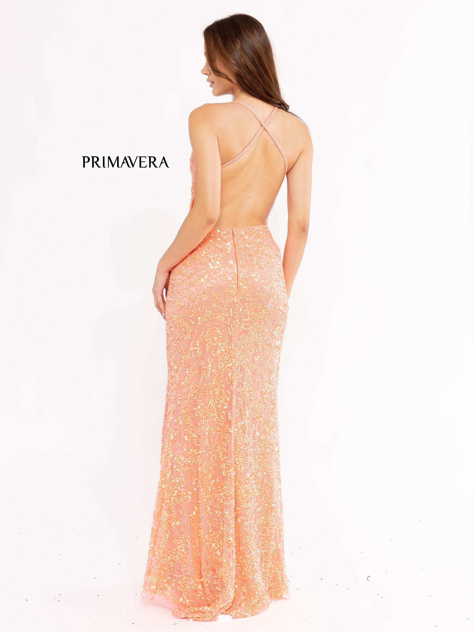 Primavera Couture 3295 Exclusive  Prom Dress, Formal Evening Gown.  This exclusive prom dress is designed with sequins throughout.  I has a V neckline with beaded spaghetti straps that crisscross in the open back.  It is long with a left side slit.  Available Colors:  Neon Coral  Available Sizes: 0, 6