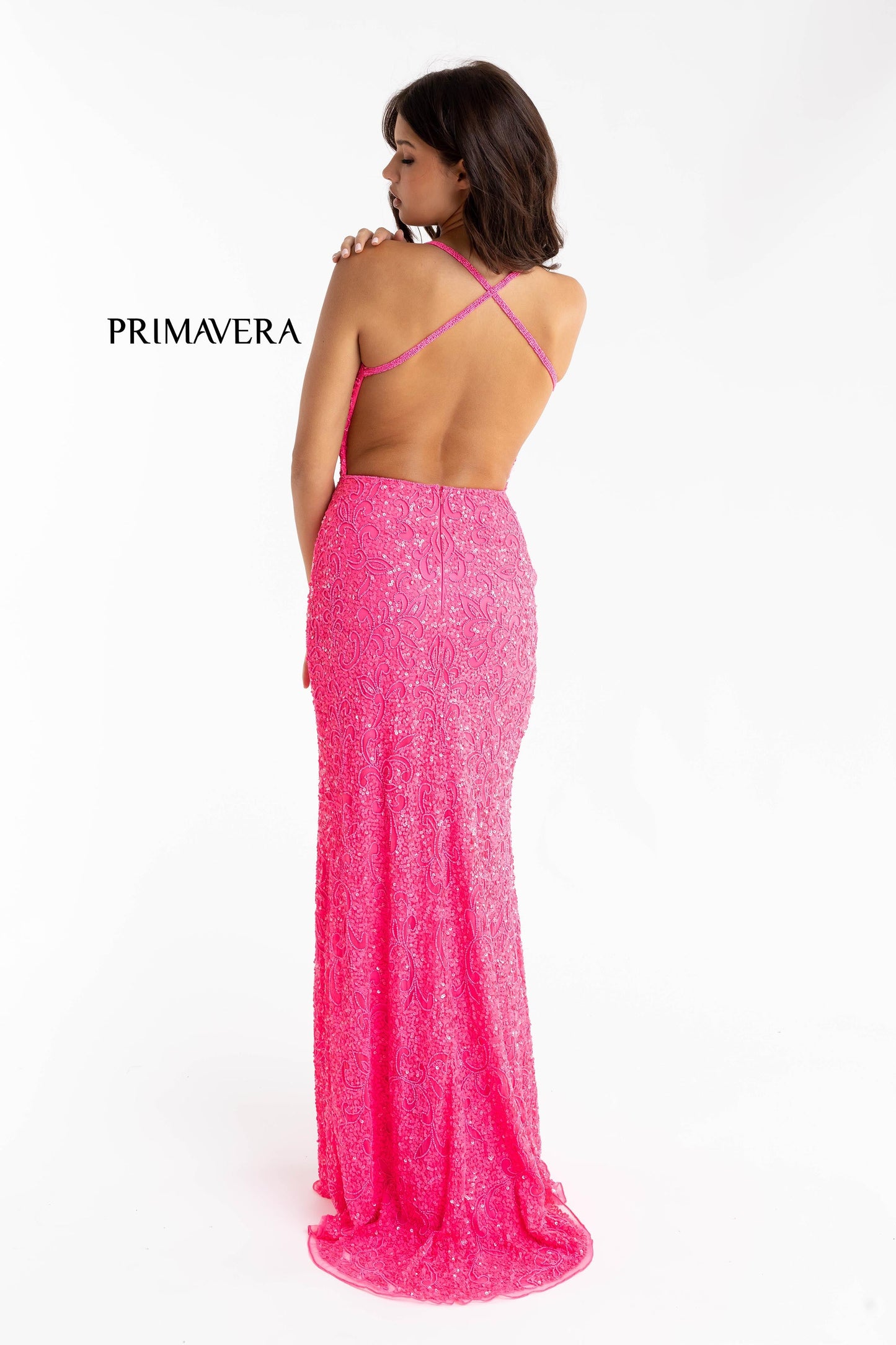 Primavera Couture 3295 Exclusive  Prom Dress, Formal Evening Gown.  This exclusive prom dress is designed with sequins throughout.  I has a V neckline with beaded spaghetti straps that crisscross in the open back.  It is long with a left side slit.  Available Colors:  NEON PINK  Available Sizes:  000