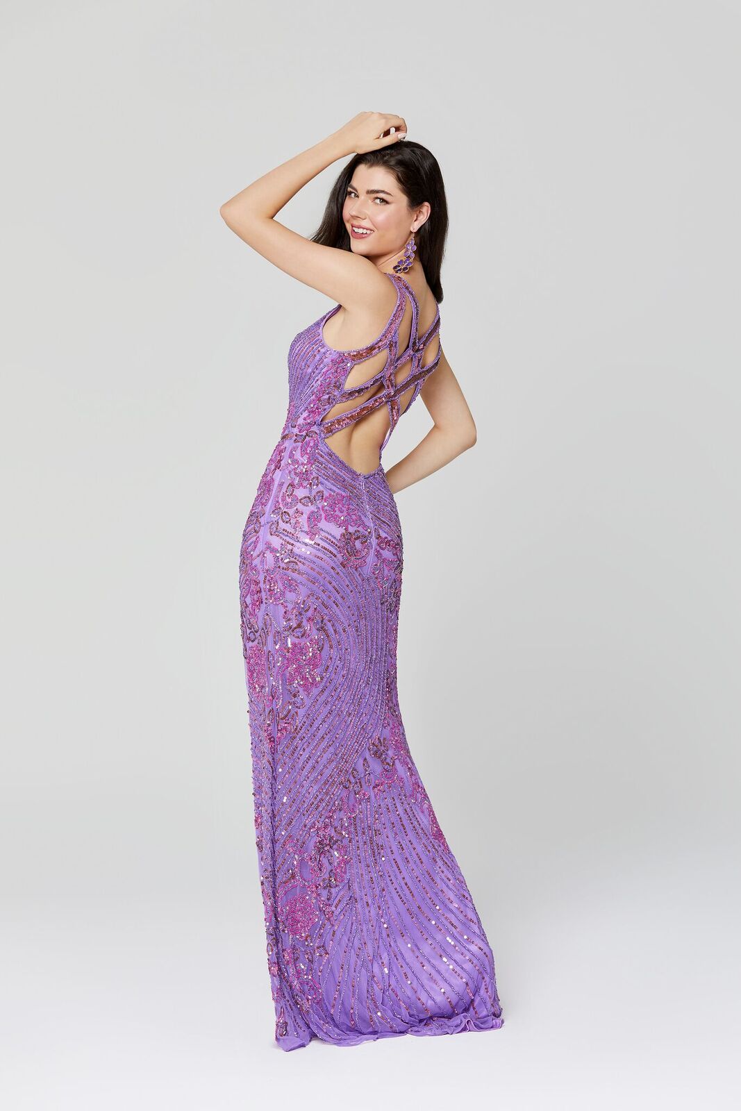 Primavera Couture 3412 v neckline sequin beaded evening gown with beaded belt waistline and side slit.  This prom dress features multiple straps that cross in the open back. Great for prom or pageant. 