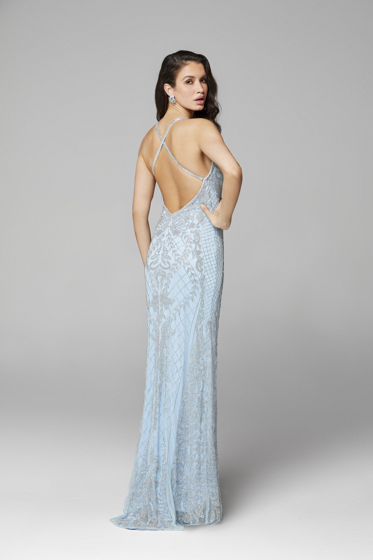 Primavera Couture 3428 is a beaded sequins Prom Dress, Pageant Gown, & Formal Evening Wear gown. This long Gown Features a v neckline with spaghetti straps that criss cross in the open back   Color Powder Blue  Size 8