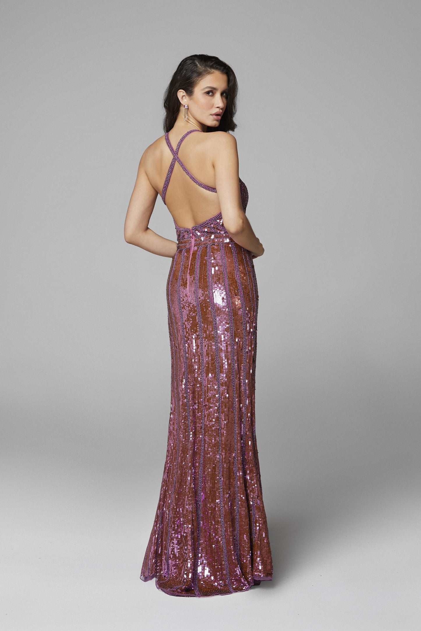 Primavera Couture 3441 is a iridescent sequins long formal Prom Dress, Pageant Gown, Wedding Dress & Formal Evening Wear gown. Featuring a v neckline with Iridescent Multi sequins and Hand Embellishments. This evening gown is perfect for any formal event! Slit in skirt. Available colors:  Ivory, Royal Blue, Teal, Peacock, Pink, Raspberry Available sizes:  00,0,2,4,6,8,10,12,14,16,18