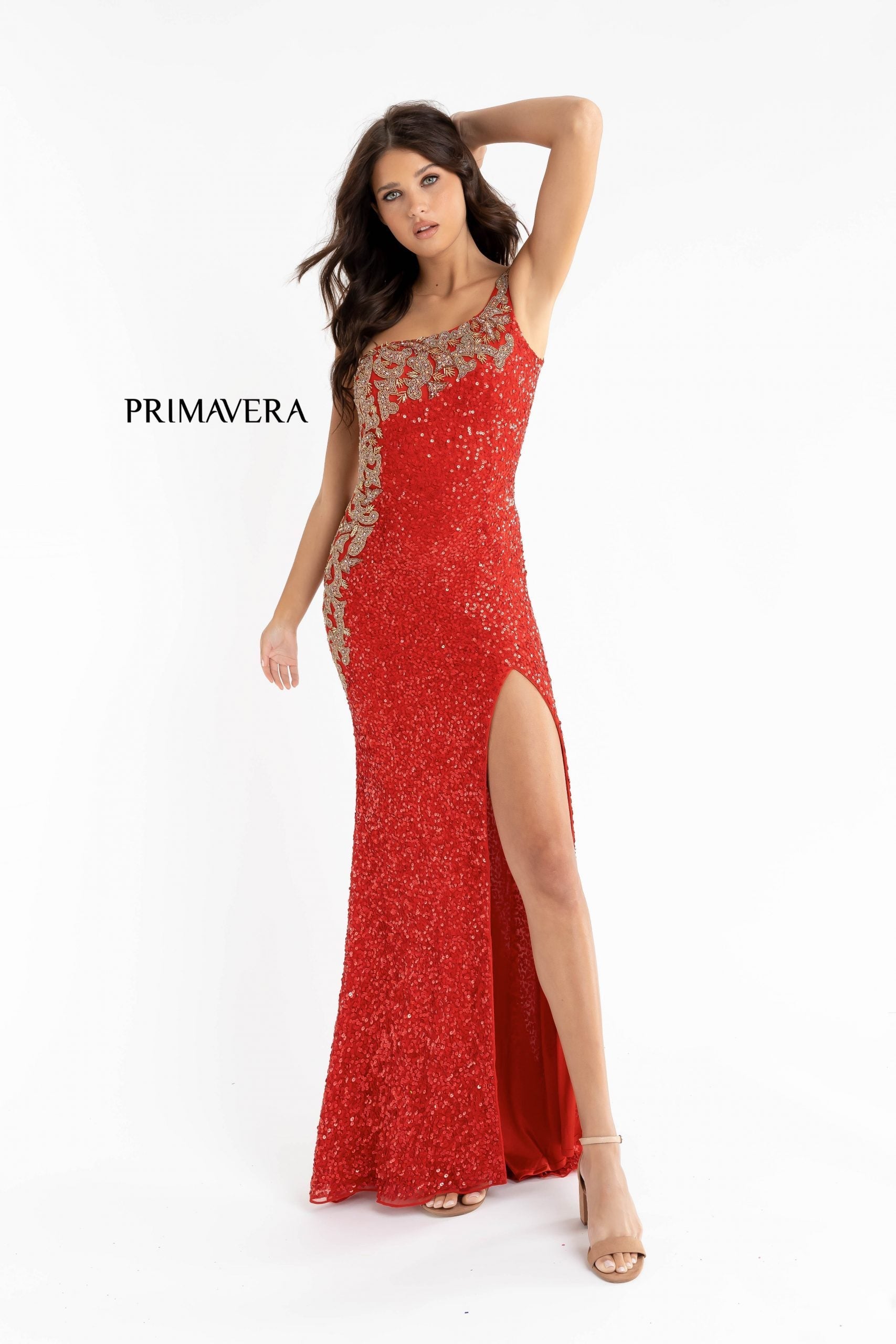 Primavera Couture 3637 is a stunning Long Fitted Sequin Embellished Formal Evening Gown. This One Shoulder Prom Dress Features Beaded Embellishments cascading from the one shoulder neckline down the side of the gown along the hip. Slit in skirt with a sweeping train. Great Pageant Formal Style.
