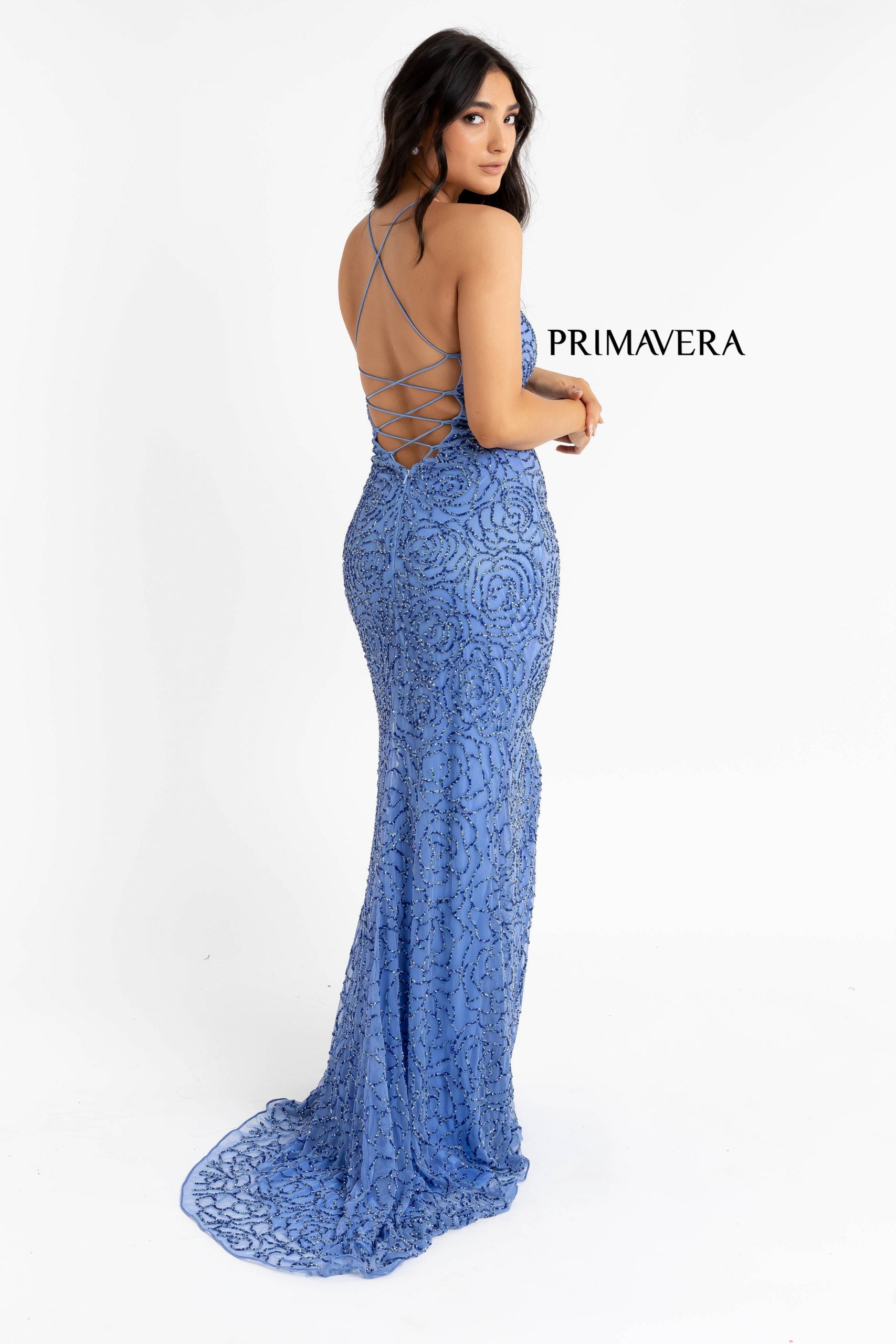 Primavera Couture 3638 is a stunning Long Fitted Formal Evening Prom Dress. Featuring Beaded Floral Embellishments along the entire evening gown. Scoop neckline with spaghetti straps leading around to an open back with a lace up tie corset closure. Slit in skirt and sweeping train. Great Prom & Pageant Style!