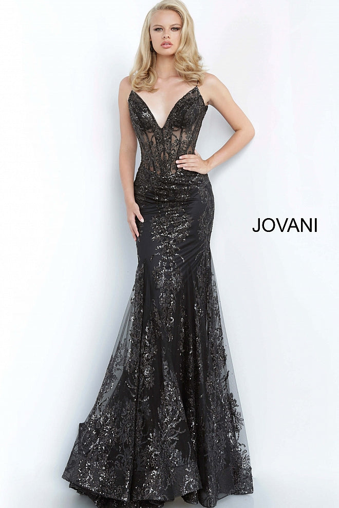 Shine like a Diamond in Jovani 3675! This Gown Features an Embellished Sheer Corset Style Bodice with a Deep V Neckline. Mermaid Silhouette with a Glitter & Crystal Overlay on Tulle. 