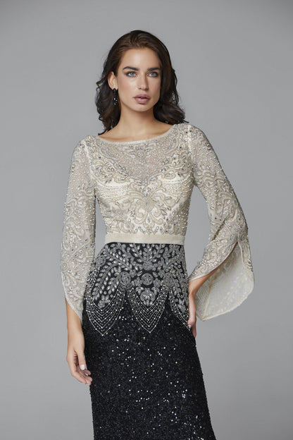 Primavera Couture 3680 This is a long hand beaded evening gown with a bateau neckline and sheer long embellished bell sleeves. It is multi colored and fitted to the floor with an embellished waistline. Available colors:  Black Nude, Charcoal Gold, Forest Green  Available sizes:  0-24