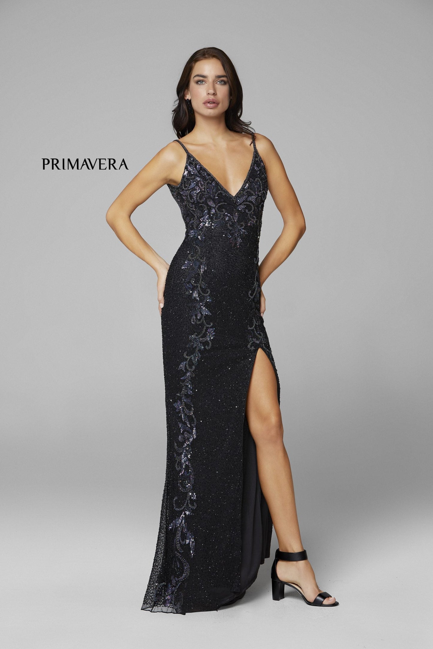 Primavera Couture 3727 This is a beautiful long beaded prom dress.  The V neckline is surrounded by gorgeous floral details that extend down the sides of the dress.  The back is a v open back and the skirt has a slit and sweeping train.  A magnificent choice for prom or formal evening dress.  Available colors:  Midnight, Black, Ivory, Mint, Red, Rose, Neon Pink,   Available sizes:  000-24