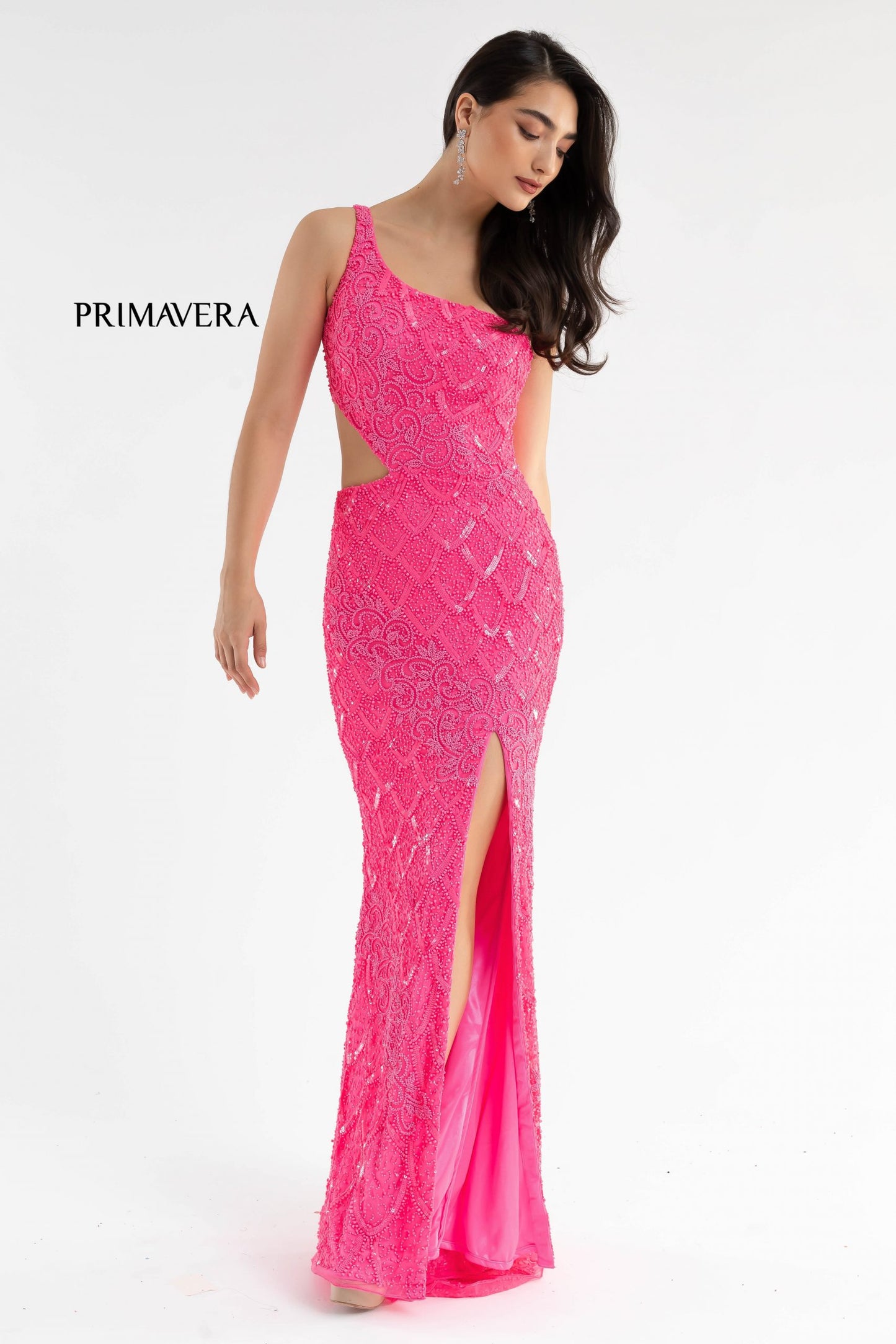 Primavera Couture 3729 This iridescent prom dress is sure to stand out in a crowd.  With its one shoulder design and side cutout, it makes an excellent choice for prom.  It ends with a slit and sweeping train.  Colors:  NEON PINK, NEON CORAL, SAGE GREEN, LIGHT TURQUOISE, BRIGHT BLUE, ORANGE, EMERALD, PURPLE, ROYAL BLUE, PINK, RASPBERRY, IVORY, GOLD, CHARCOAL, BLACK, RED  Sizes:  000, 00, 0, 2, 4, 6, 8, 10, 12, 14, 16, 18