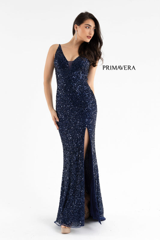 Primavera Couture 3792 Exclusive Prom Dress.  This sequin long prom dress with a v neckline and a side slit.  This dress features an open back with three straps on each side that meet in the middle. The prom dress ends in a sweeping train.  Colors:  Black  Sizes:  00, 6