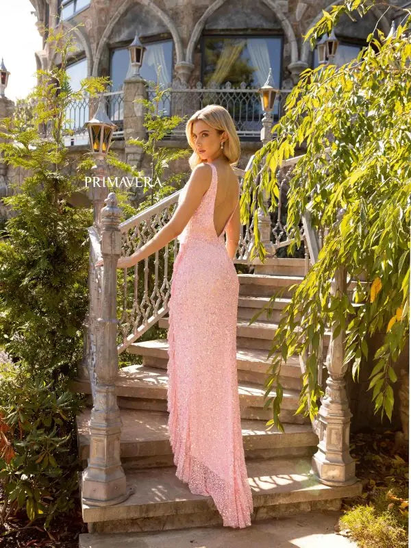 Primavera Couture 3799 Prom Dress Long Beaded Gown. This gown has an open back. This gown has some beautiful ruffles going down the slit. 