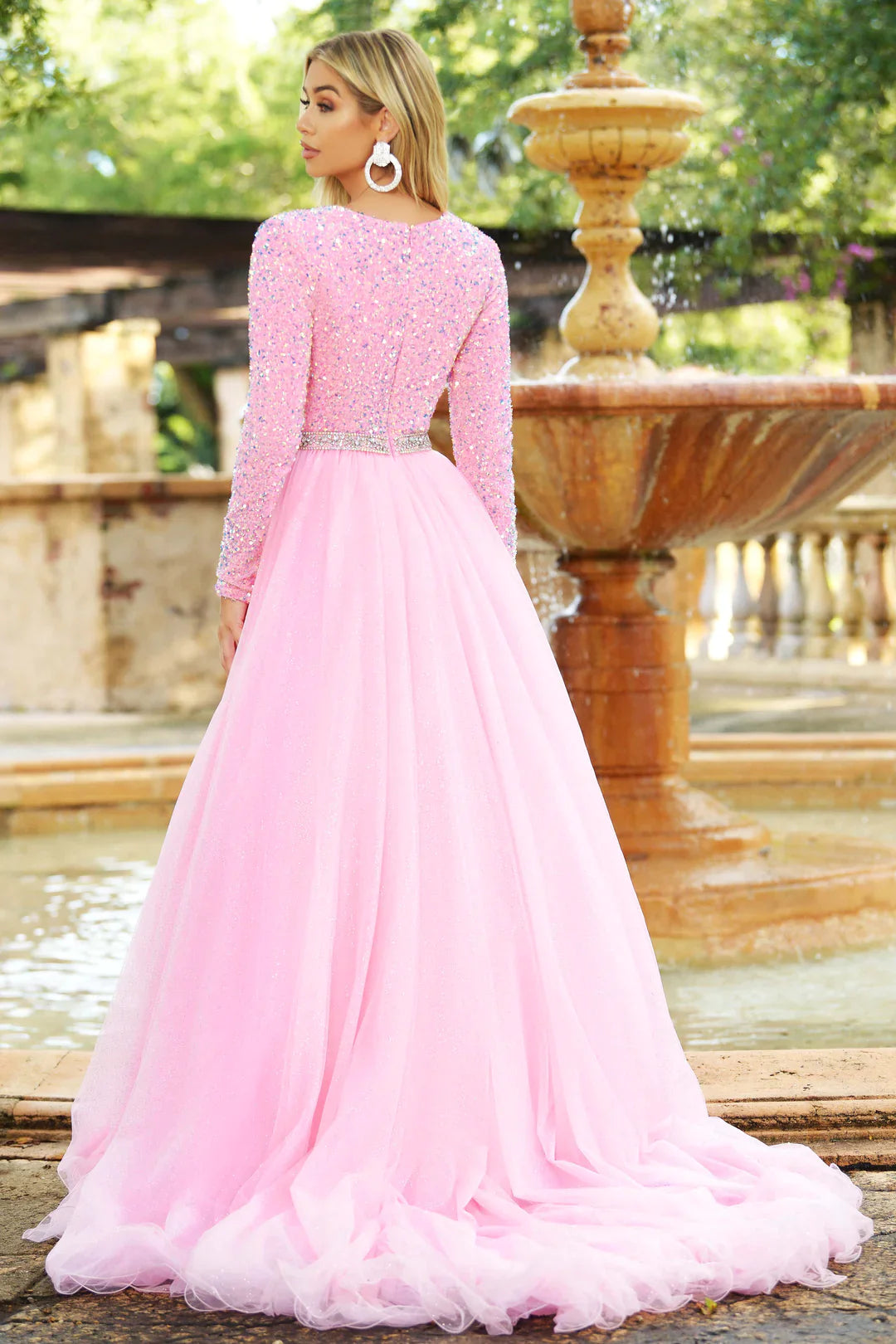 Ava Presley 38332 Long Sleeve Velvet Sequin Bodice with a V Neckline. Glitter Shimmer A Line Ballgown skirt with a crystal rhinestone waistband. full modest back coverage. Prom Dress Pageant Gown.  Sizes: 00-24  Colors: Royal, Red, Iridescent White, Iridescent Pink, Iridescent Light Blue