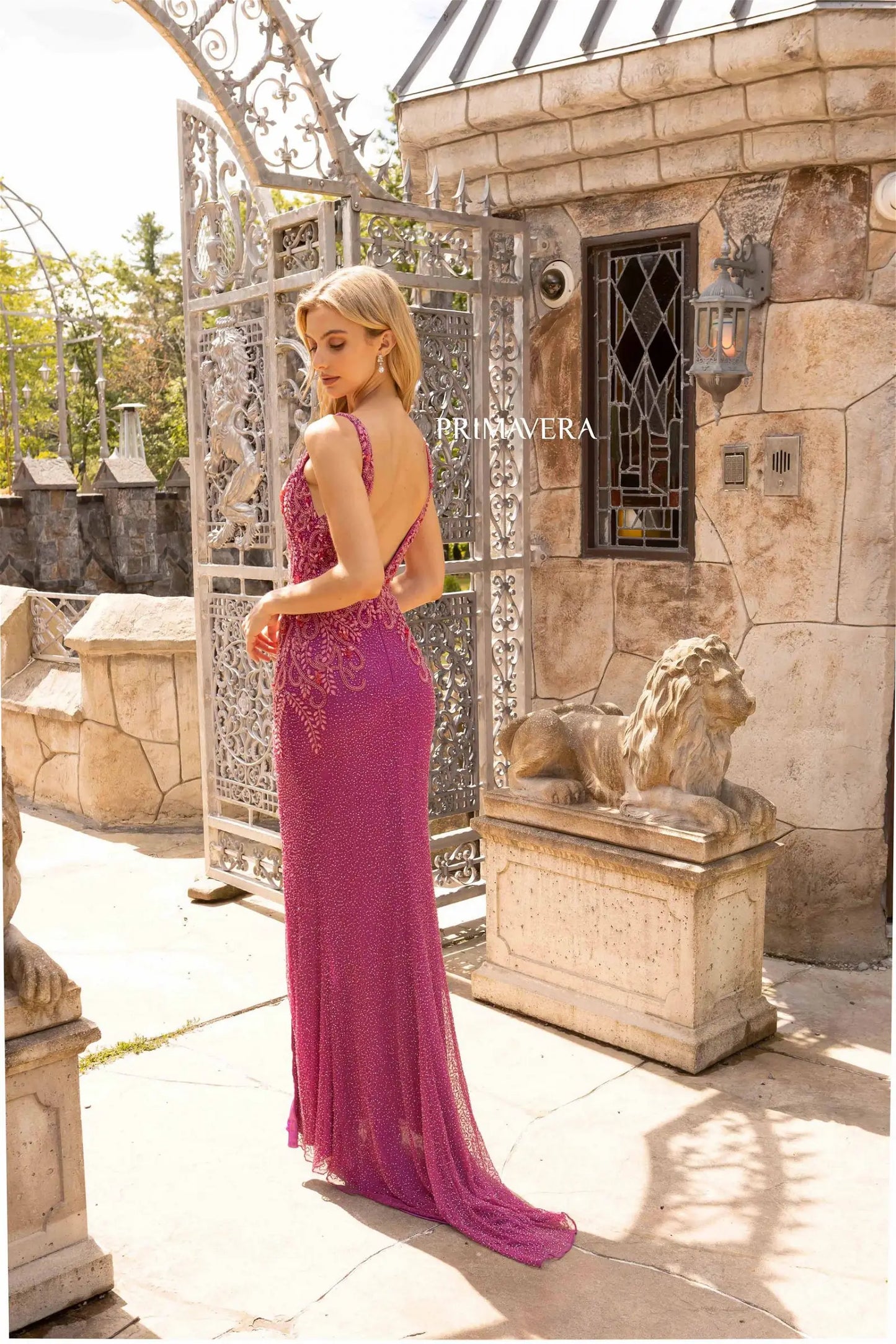 Primavera Couture 3923 is an elegantly beaded evening gown that has a beaded design on the front top and the straps on the back that flow down the sides giving you a curvy effect.  The bottom of the dress has sparkling bugle beads throughout.  It is a V neckline, wide straps and V back.  Available Sizes: 000-24  Available Colors: ROSE PINK,POWDER BLUE,FUSHIA,CORAL
