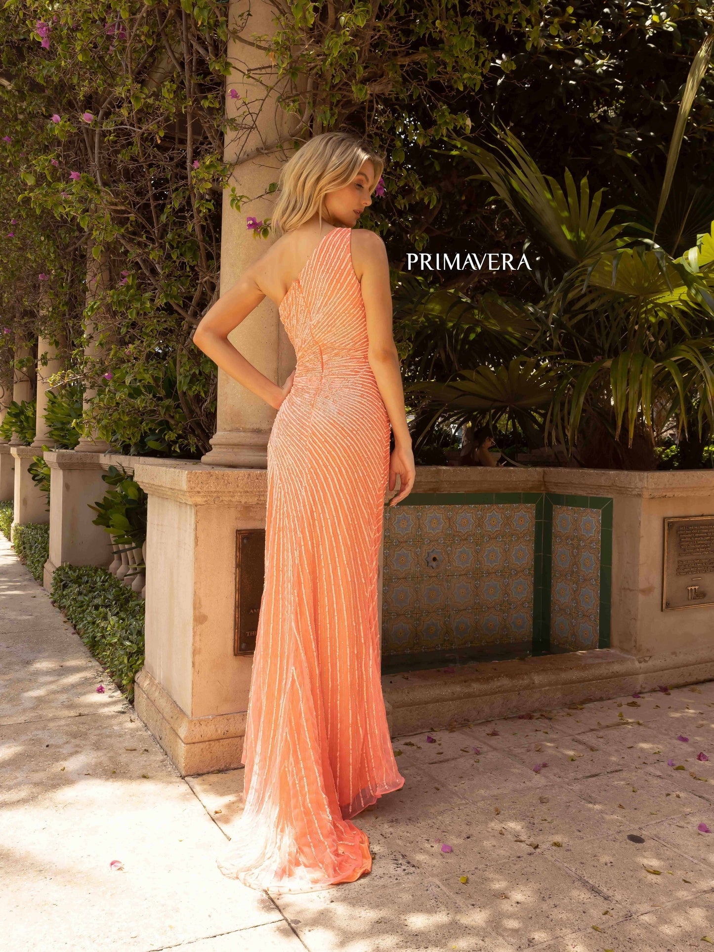 Primavera Couture 3932 Long Fitted One Shoulder Prom Dress Slit Beaded Sequin Gown with sweeping train.  Sizes: 000-24  Colors: Coral, Nude/Gold, Black, Red