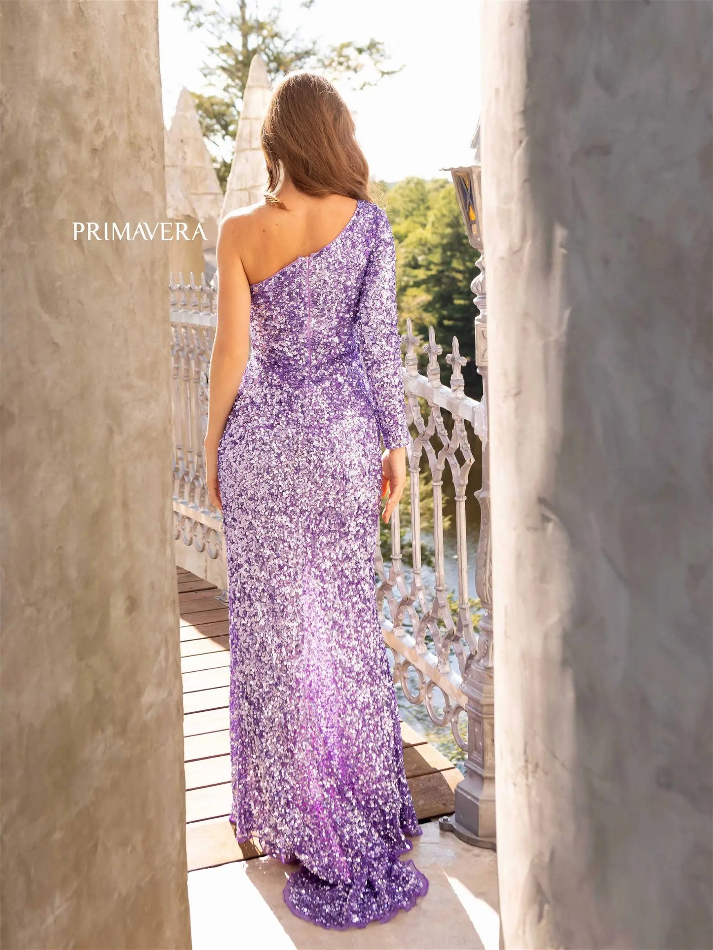 Primavera Couture 3942 Prom Dress Long Beaded Gown. This Gown has such a beautiful slit plus a long sleeve.