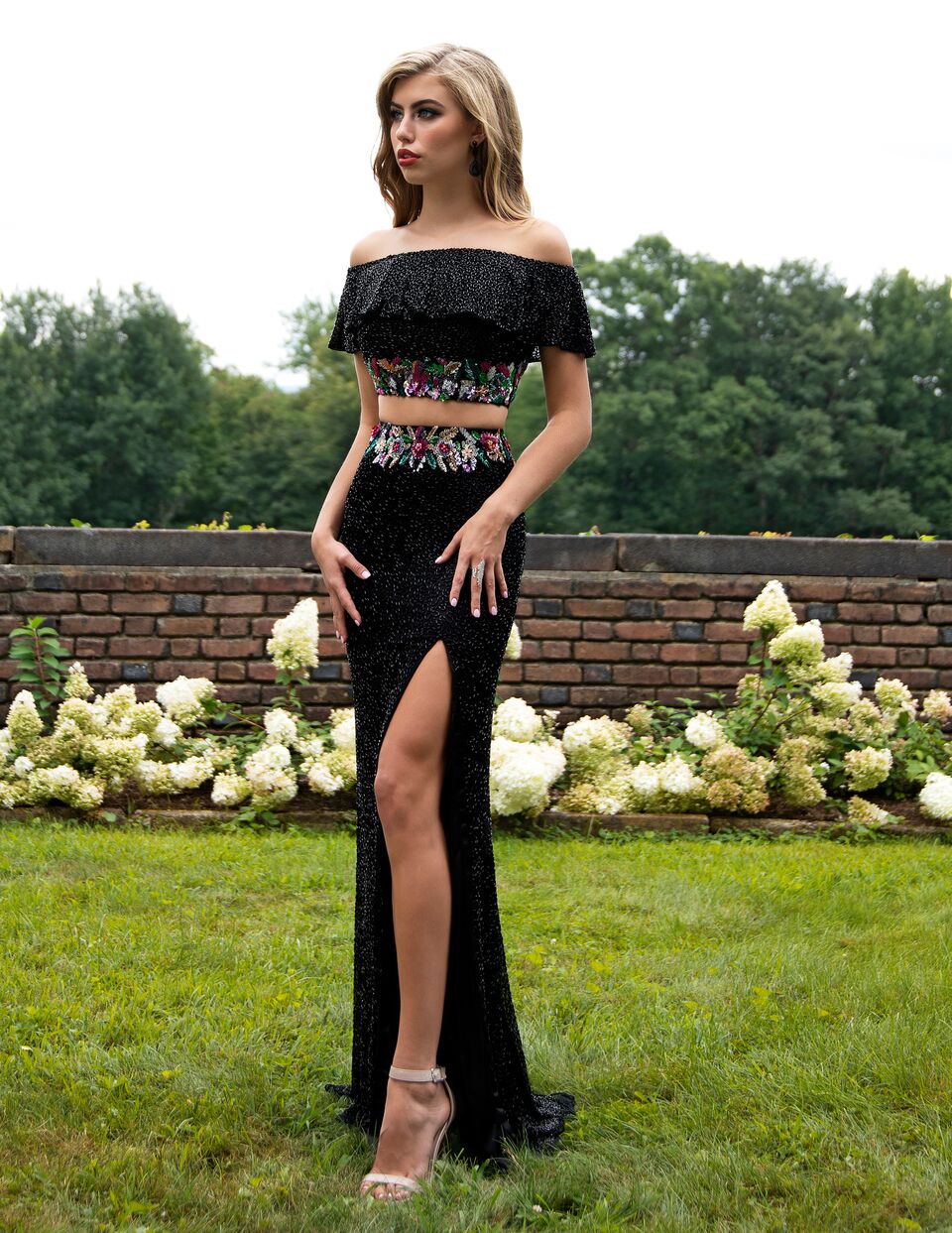 Primavera Couture 3215 Black Size 16 Prom Dress Pageant Gown  A two piece beautiful prom gown with off the shoulder boho beaded ruffle sleeves and a beaded floral design waistline with a side slit. 