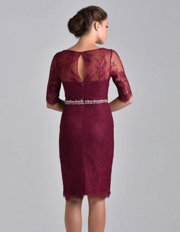 Nina Canacci M214 is a short fitted formal evening cocktail dress. featuring a sheer eyelash lace high neckline and lone 3/4 sleeves. Fitted solid lace knee length gown has eyelash lace hem. Perfect for wedding guest, Mother of the Bride/Groom, Formal & Semi formal events! Matching solid 3/4 cuff sleeve bolero jacket.  Available Sizes: 6, 8, 10, 12,18  Available Colors: Grey, Black, Wine, Navy