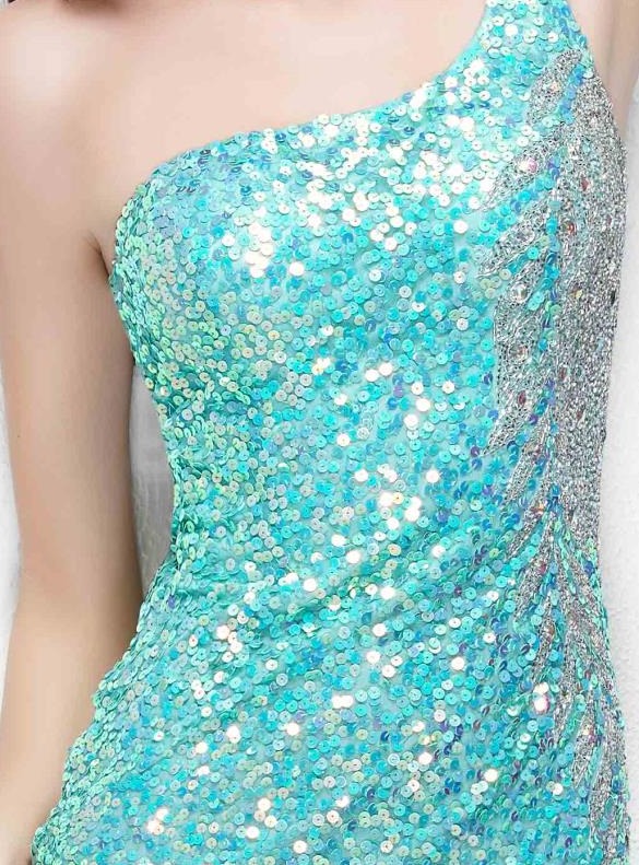 Primavera Couture 9988 is a long fitted asymmetrical one shoulder neckline fully embellished sequin formal prom & Pageant Dress. Featuring beading & Crystal accents along the side & Back. Sheer embellished long column skirt with sweeping train. Available Size: Aqua  Available Color: 2
