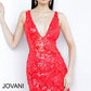 Jovani 4552 Short V-Neck Fitted Sequin Cocktail Dress Sheer Sequin Lace. Experience a sparkling night in the Jovani 4552 dress. Elegantly designed with a V-neckline and fitted silhouette, it is crafted from sheer sequin lace and finished with sparkling sequin detailing for added shine. Perfect for cocktail or evening events.