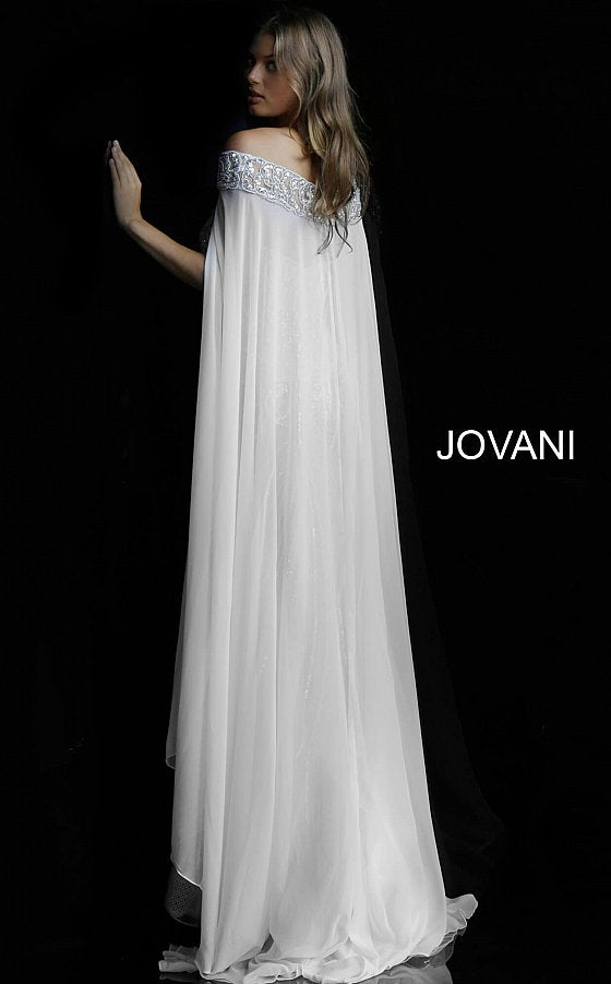 Jovani 45566 is a true stunner! This long Fitted strapless sweetheart neckline features a fully Crystal Embellished and Beaded Vintage Couture Design bodice. Sheer lace underlay. This Wedding Dress is fit for a Goddess. Over the shoulder Crystal embellished Sheer Cape Perfect for cool weather & an magical awe factor. This gown is a true red carpet masterpiece! Fuchsia is a perfect Barbie look for your next Pageant & Is 100% Stage Worthy!   Available Colors: charcoal, fuchsia, ivory  Available Sizes: 00-24